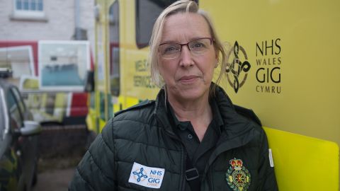 Angie Dymott, a paramedic with the Welsh Ambulance Service, was hospitalized with coronavirus last April. She recovered and has returned to work.