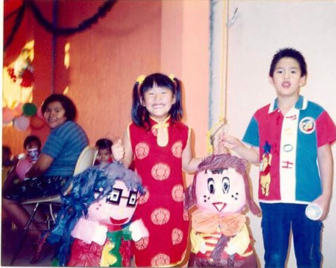 Kumamoto's sister Elizabeth and brother Ivan dressed up in pre-school in Mexico.