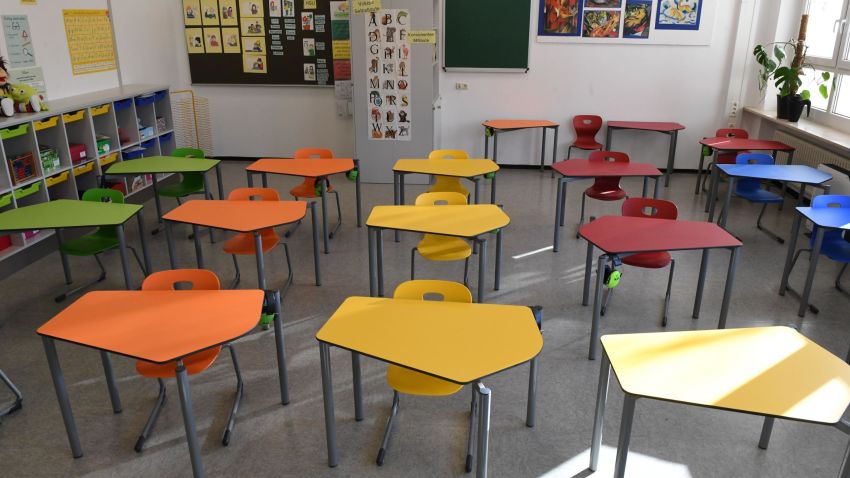 An empty classroom in a primary school in Eichenau near Munich, southern Germany, is pictured on December 18, 2020, amid the ongoing novel coronavirus Covid-19 pandemic. - Long held up as a European success story in the fight against the pandemic, Germany has been hit hard by a second coronavirus wave that has brought record daily infection numbers and deaths. Crisis talks between German Chancellor Angela Merkel and regional leaders saw the country return to a partial lockdown on Wednesday, December 16, 2020, shutting schools and non-essential shops in addition to the existing restrictions, until at least January 10, 2021. (Photo by Christof STACHE / AFP) (Photo by CHRISTOF STACHE/AFP via Getty Images)