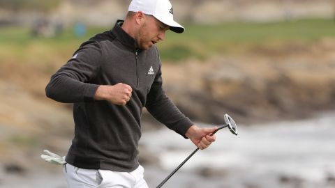 Daniel Berger celebrates his eagle putt to win on the 18th.