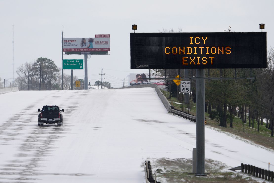 A truck braves the frozen roads in Houston on Monday, February 15.