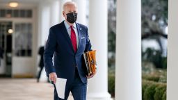 In this White House photo, President Joe Biden walks along the Colonnade of the White House Thursday, January 28, 2021, en route to the Oval Office. 