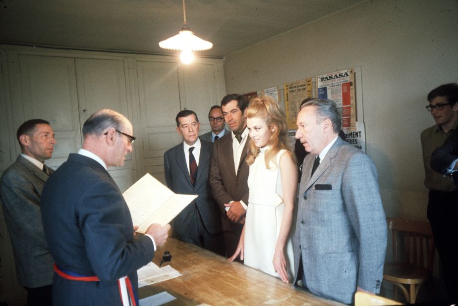 Fonda married French film director Roger Vadim, seen here in the brown suit, in 1965.