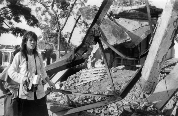 Fonda visits a site in North Vietnam that had been bombed by US airplanes. During her two-week trip in 1972, she also posed with members of the Viet Cong, met with American prisoners of war and denounced "US imperialism." After the trip, some criticized her and gave her the nickname "Hanoi Jane."