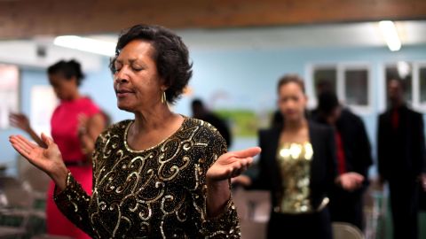 Congregants pray and sing gospel songs during a service at the True Love Worship Center in Van Nuys, California.