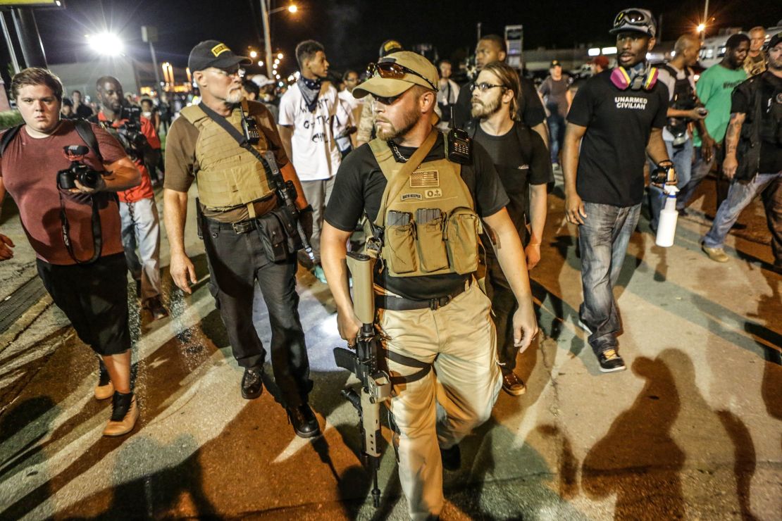 Armed Oath Keepers went to Ferguson, Missouri, after the killing of Michael Brown in 2014 and again, pictured, a year later.