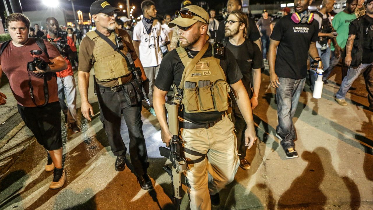 Armed Oath Keepers went to Ferguson, Missouri, after the killing of Michael Brown in 2014 and again, pictured, a year later.