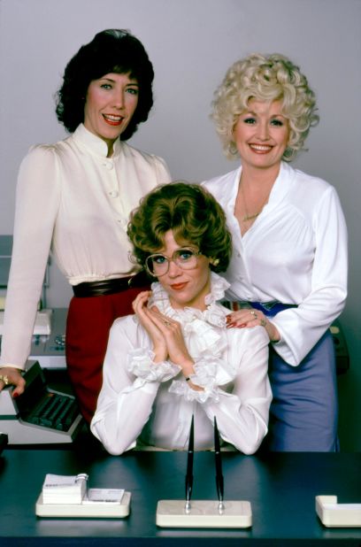 From left, Lily Tomlin, Fonda and Dolly Parton pose on the set of the 1980 film "9 to 5."