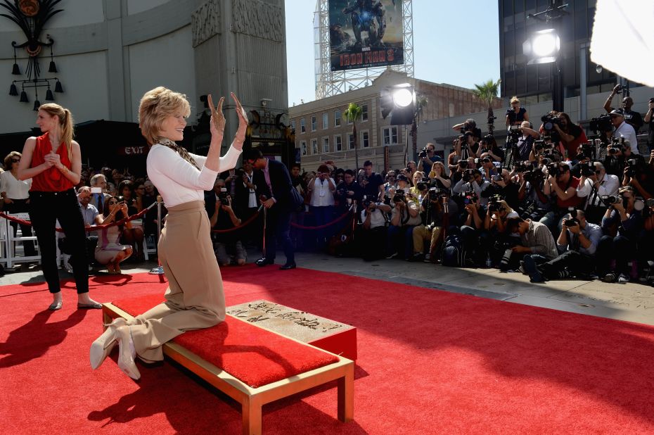 Fonda leaves her handprints at the famous TCL Chinese Theatre in Hollywood in 2013. Her handprints and footprints were placed next to those of her father.
