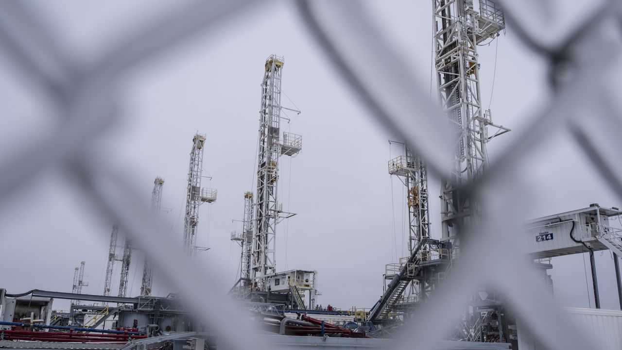 Idle oil drilling rigs in a lot near Midland, Texas, U.S, on Saturday, Feb. 13, 2021. The arctic freeze gripping the central U.S. is raising the specter of power outages in Texas and ratcheting up pressure on energy prices already trading at unprecedented levels. Photographer: Matthew Busch/Bloomberg via Getty Images