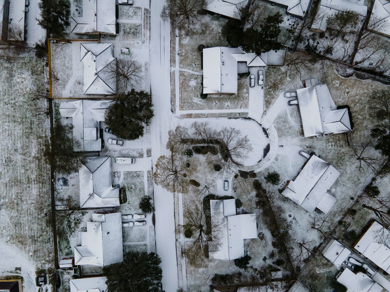 Homes in the Westbury neighborhood of Houston are covered in snow on Monday, February 15.