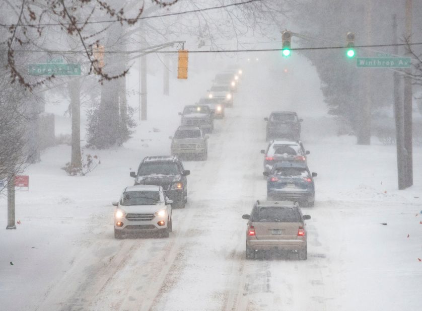 Motorists take it slow in Indianapolis on Monday.