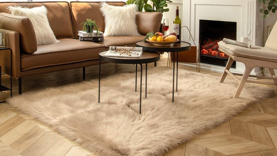 Ashler Faux Fur Beige Rectangle Area Rug