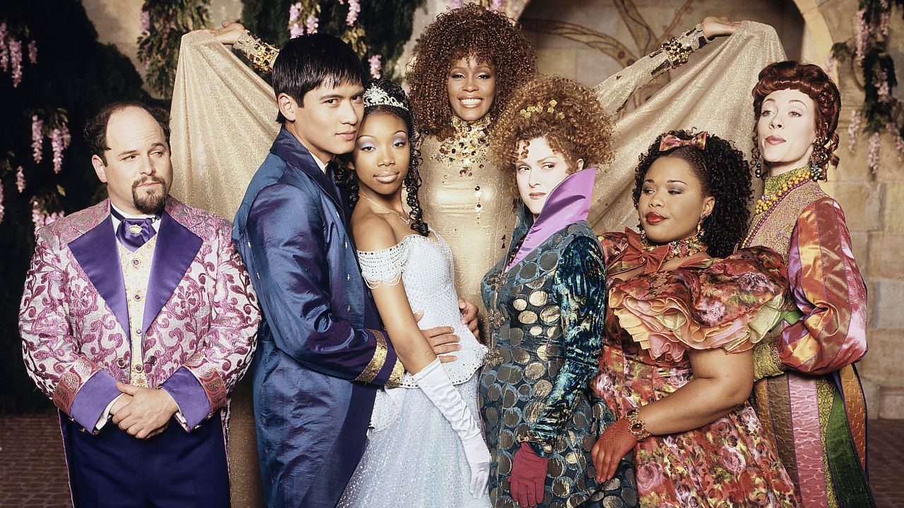 (From left) Jason Alexander, Paolo Montalban, Brandy, the late Whitney Houston, Bernadette Peters, the late Natalie Deselle Reid and Veanne Cox led the cast in "Rodgers & Hammerstein's Cinderella."