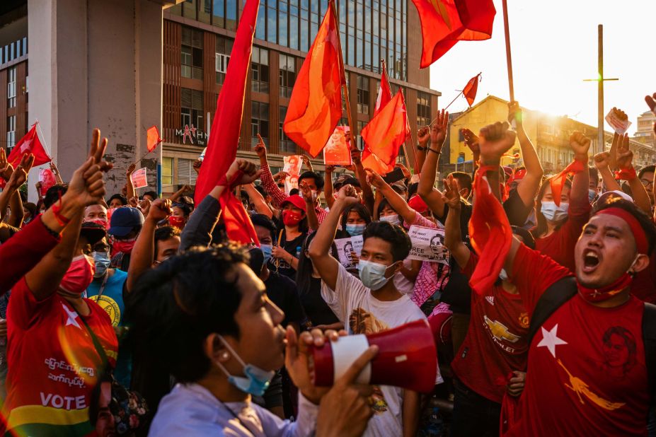 Protesters shout slogans in Yangon on February 7.