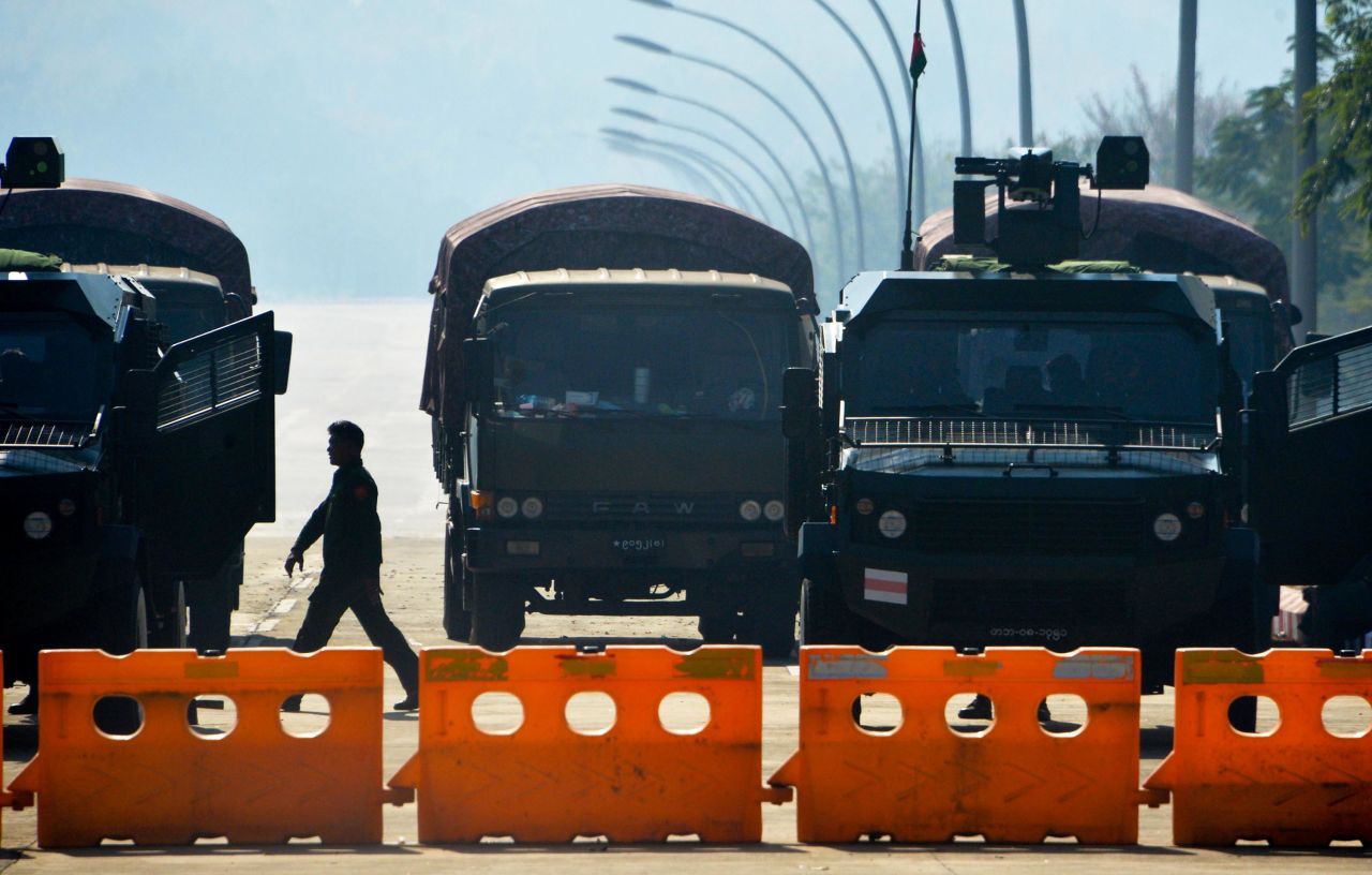 Soldiers block a road near Myanmar's Parliament on February 2, a day after the coup.