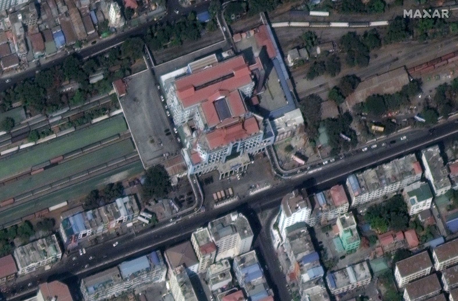 Another image from Tuesday  shows the railway station in the same city seemingly devoid of commuters, but with five large, seemingly identical closed-cargo trucks -- which appear to be army personnel trucks -- parked neatly in a row in front of the main entrance. CNN has spoken to one person who attended a large protest in Mandalay on Monday. He said there was a large presence by Myanmar's security forces.