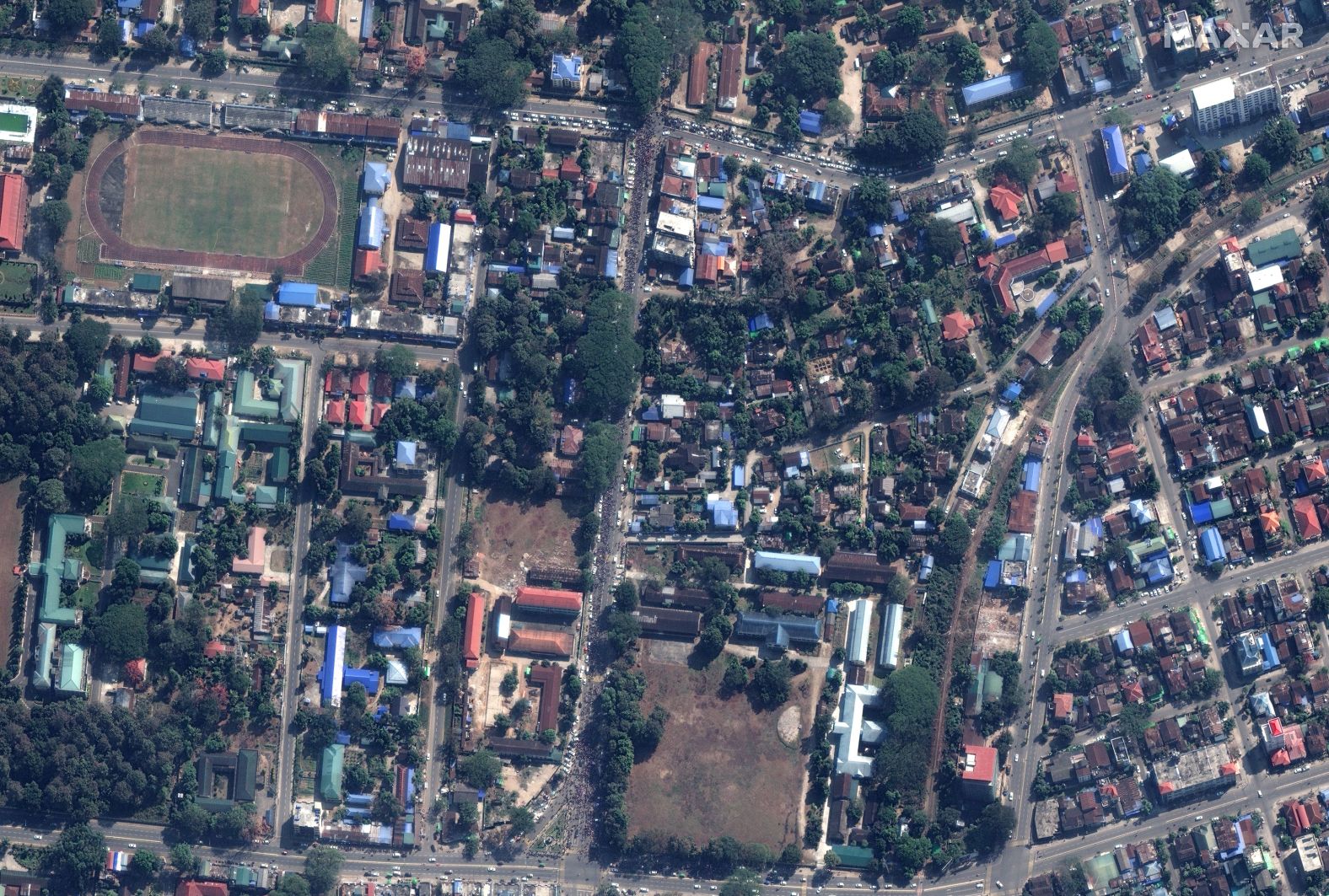  In another image of Myitkyina, protesters converge on a crossroads near the city's football stadium.