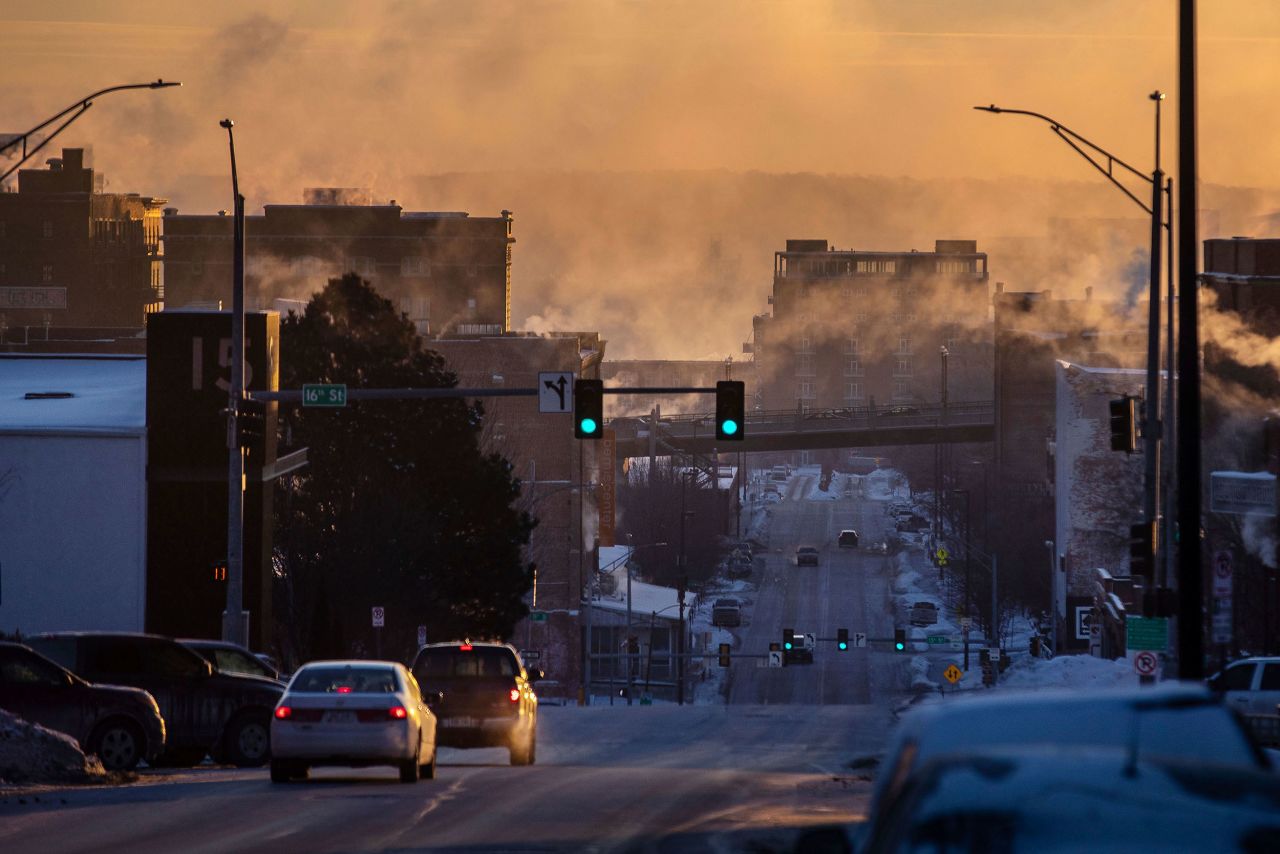 Sunlight filters through steam in Omaha, Nebraska, where temperatures dropped below zero on Tuesday.