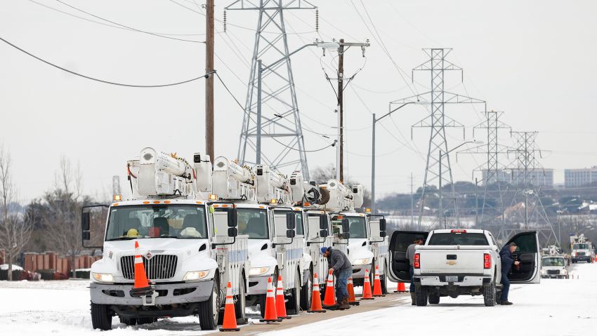 FORT WORTH, TX - FEBRUARY 16: Pike Electric service trucks line up after a snow storm on February 16, 2021 in Fort Worth, Texas. Winter storm Uri has brought historic cold weather and power outages to Texas as storms have swept across 26 states with a mix of freezing temperatures and precipitation. (Photo by Ron Jenkins/Getty Images)