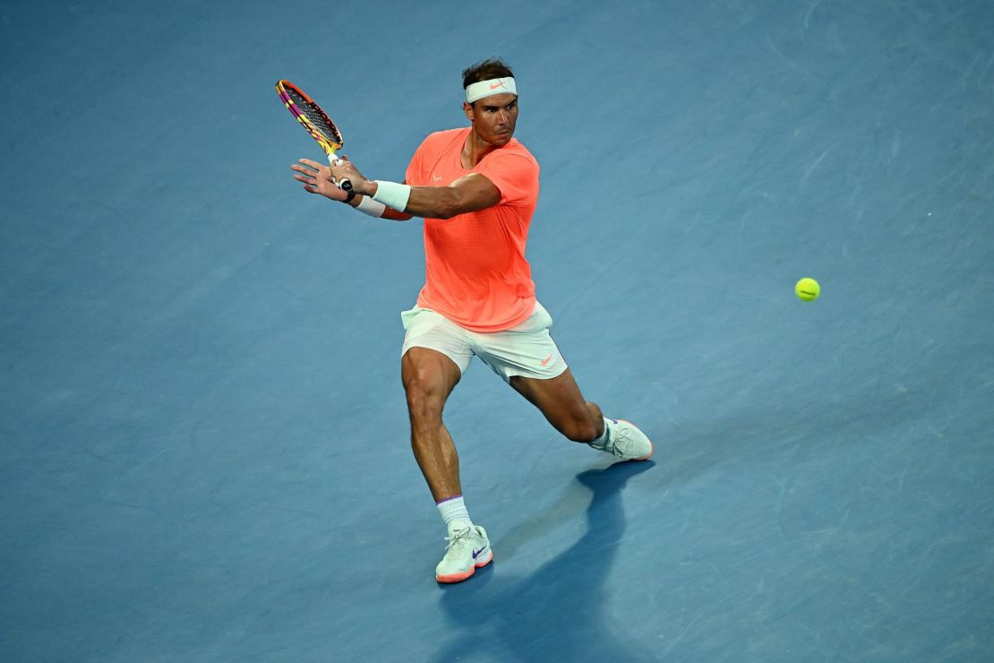 Nadal plays a backhand during his match against Tsitsipas.