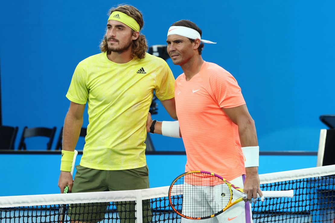 Tsitsipas and Nadal pose prior to their match.