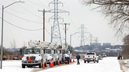 fFORT WORTH, TX - FEBRUARY 16: Pike Electric service trucks line up after a snow storm on February 16, 2021 in Fort Worth, Texas. Winter storm Uri has brought historic cold weather and power outages to Texas as storms have swept across 26 states with a mix of freezing temperatures and precipitation. (Photo by Ron Jenkins/Getty Images)