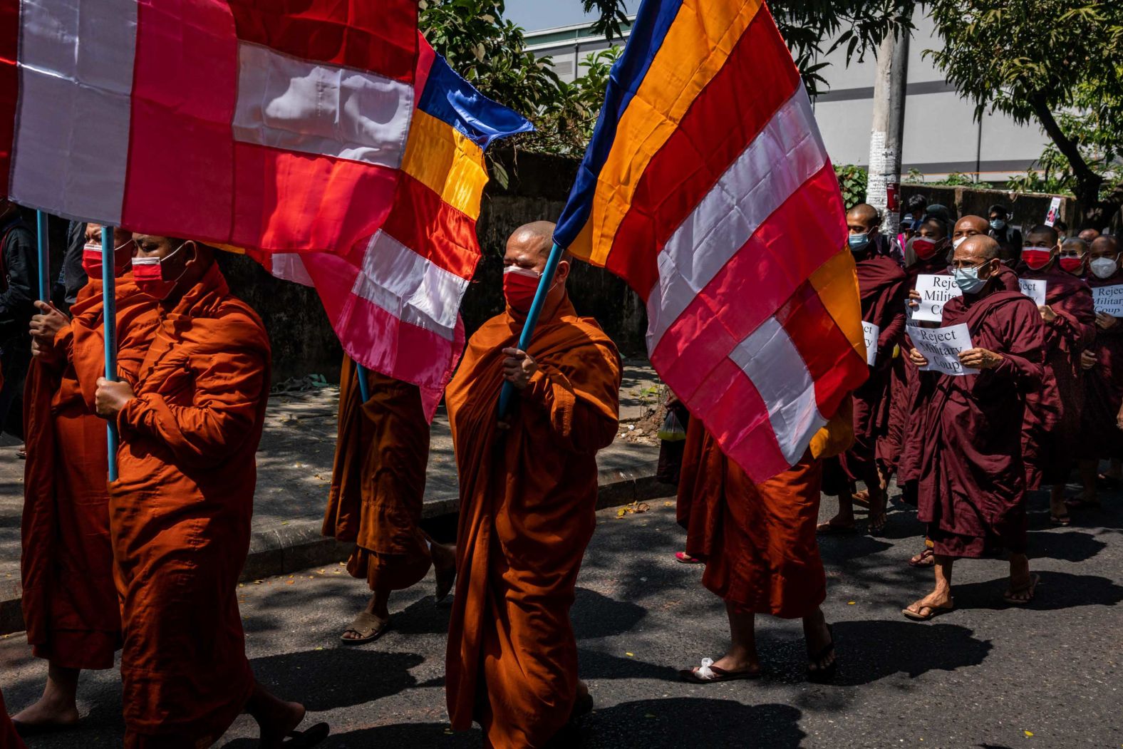 Buddhist monks march during an anti-coup protest in Yangon on February 16.