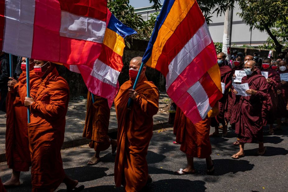 Buddhist monks march during an anti-coup protest in Yangon on February 16.