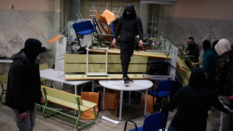 Hasel's supporters make barricades inside the University of Lleida on Monday.