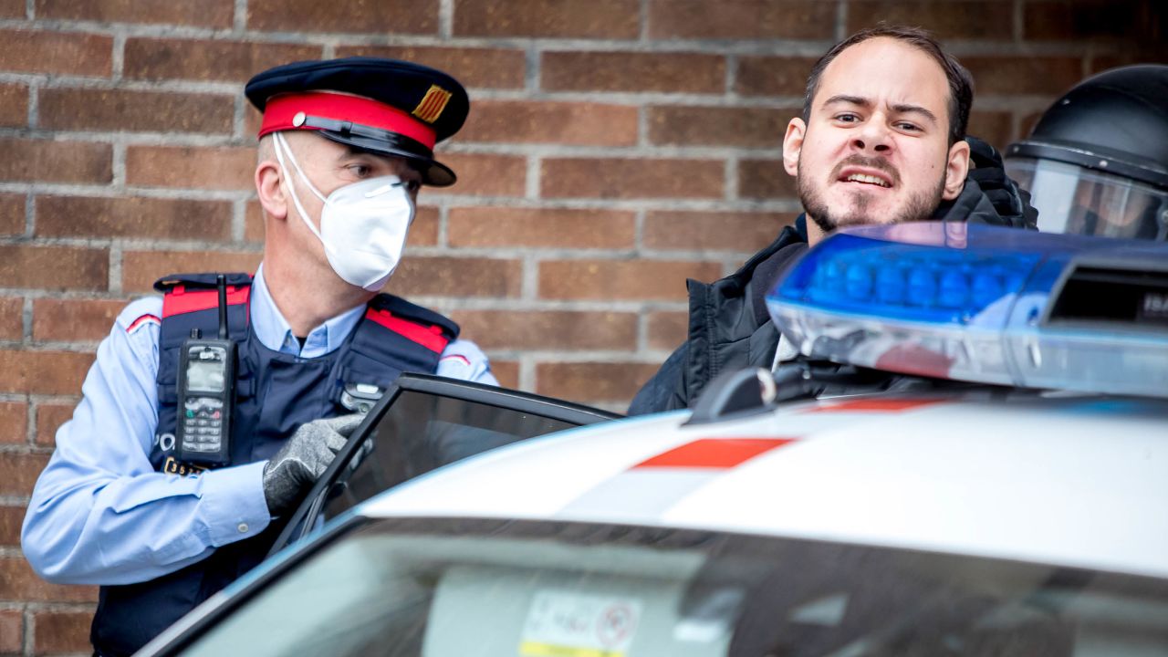 Hasel is arrested by police officers at the University of Lleida, Catalonia, on February 16.
