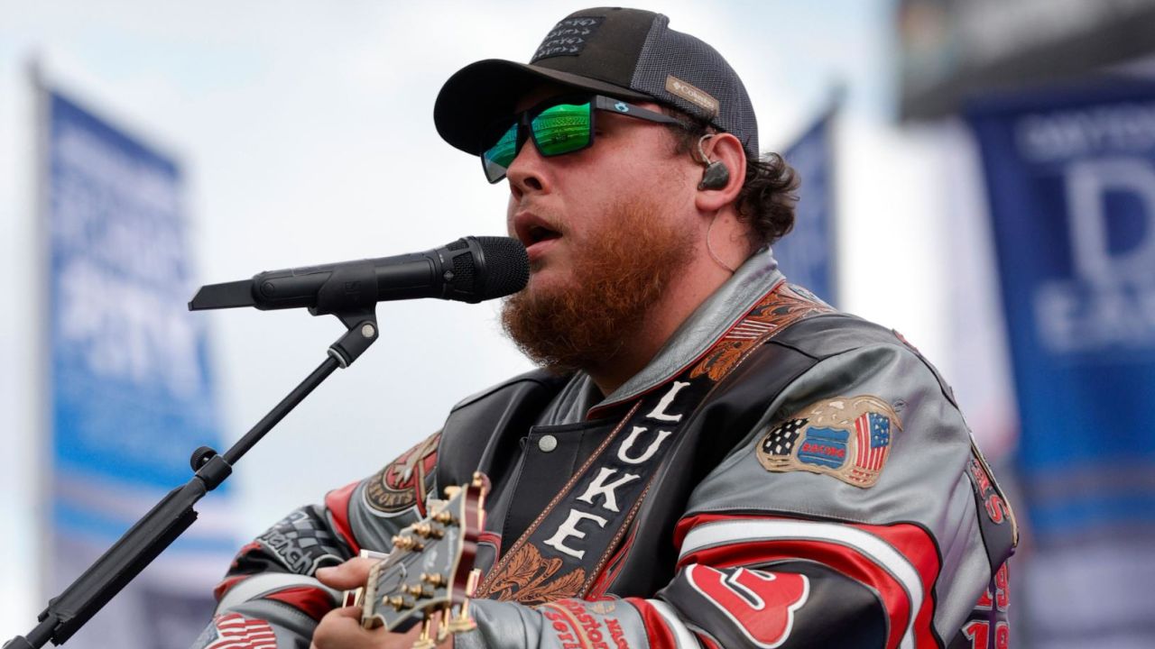 Luke Combs, performing prior to the NASCAR Cup Series 63rd Annual Daytona 500 at Daytona International Speedway on Feb. 14, 2021 in Daytona Beach, Florida, is apologizing for past use of the Confederate flag in his performances. (Photo by Chris Graythen/Getty Images)