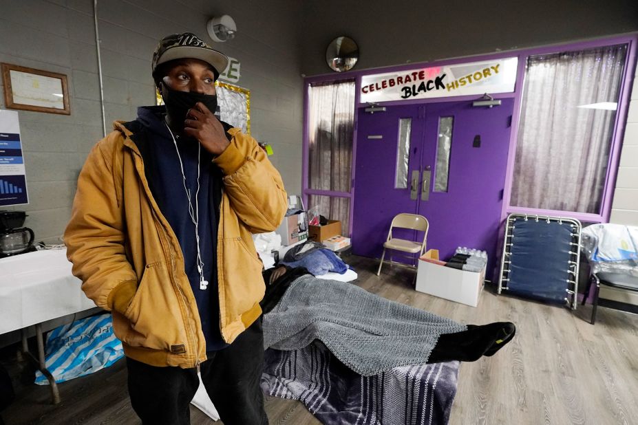 Jonathan Callahan expresses his gratitude after being referred to the warming shelter at the Johnnie Champion Community Center in Jackson, Mississippi, on Wednesday, February 17. Some people staying at the shelter had lost power, water and heat at their homes following the winter storms. Others were homeless. Food, blankets and cots were provided.