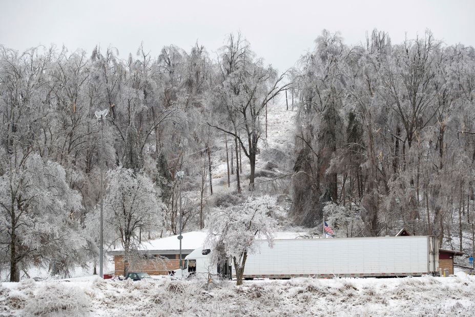 Downed and broken trees are seen over a rest stop in Huntington, West Virginia, on Wednesday.