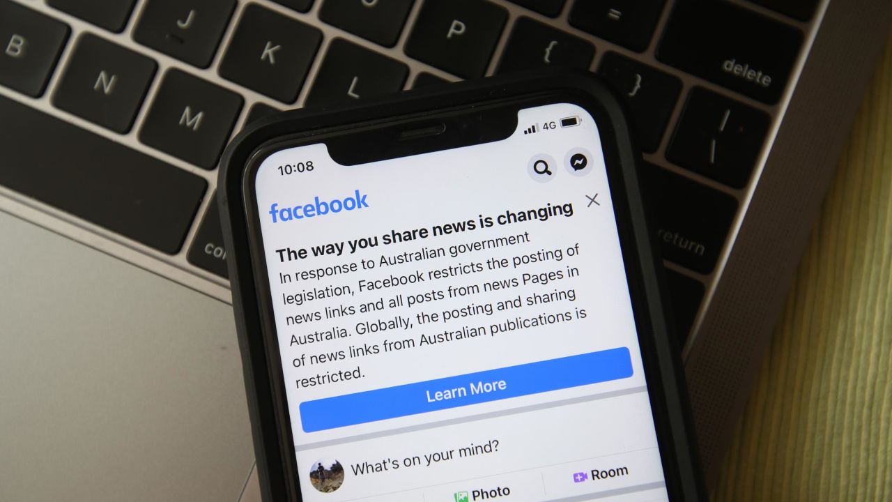 MELBOURNE, AUSTRALIA - FEBRUARY 18: In this photo illustration a message is seen on Facebook mobile, on February 18, 2021 in Melbourne, Australia. Facebook has banned publishers and users in Australia from posting and sharing news content as the Australian government prepares to pass laws that will require social media companies to pay news publishers for sharing or using content on their platforms. (Photo by Robert Cianflone/Getty Images)