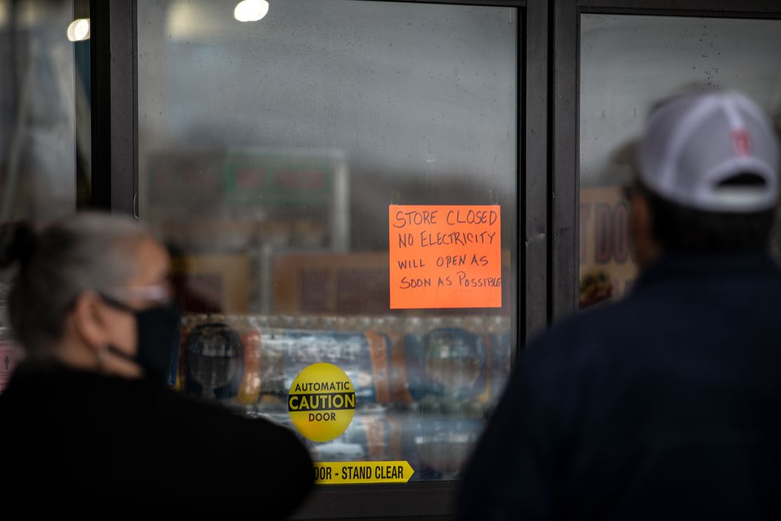 People wait in line for Fiesta Mart to open after the store lost electricity in Austin, Texas on February 17.