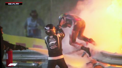 BAHRAIN, BAHRAIN - NOVEMBER 29: Romain Grosjean of France and Haas F1 is pictured on a screen escaping his crash during the F1 Grand Prix of Bahrain at Bahrain International Circuit on November 29, 2020 in Bahrain, Bahrain. (Photo by Peter Fox/Getty Images)