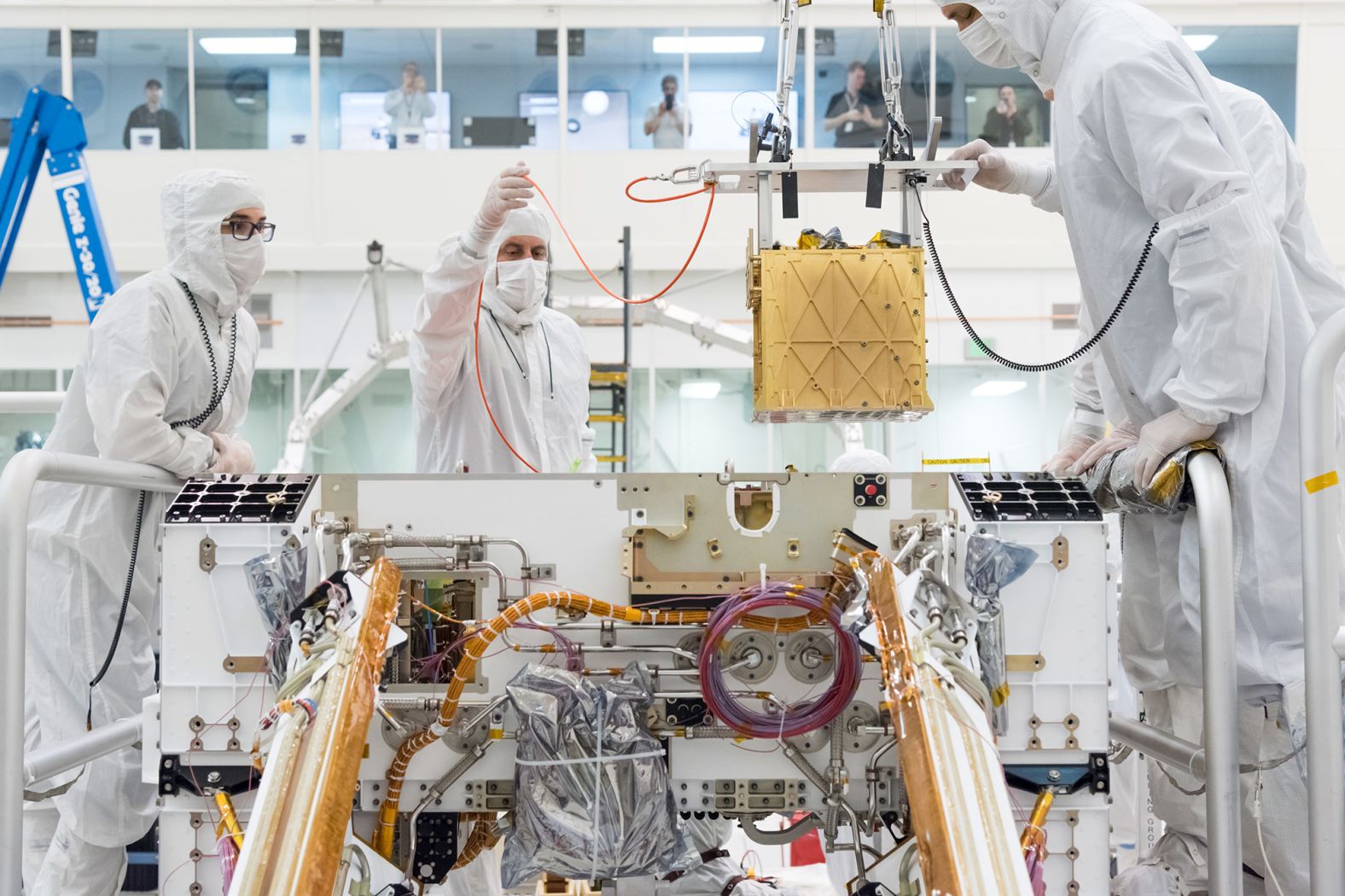 NASA workers install the Mars Oxygen In-Situ Resource Utilization Experiment, aka MOXIE, into the chassis of the Perseverance rover in March 2019. This experiment will attempt to convert Martian carbon dioxide into oxygen. This could help NASA scientists learn how to produce not only rocket fuel on Mars, but also oxygen that could be used during future human exploration of the red planet.