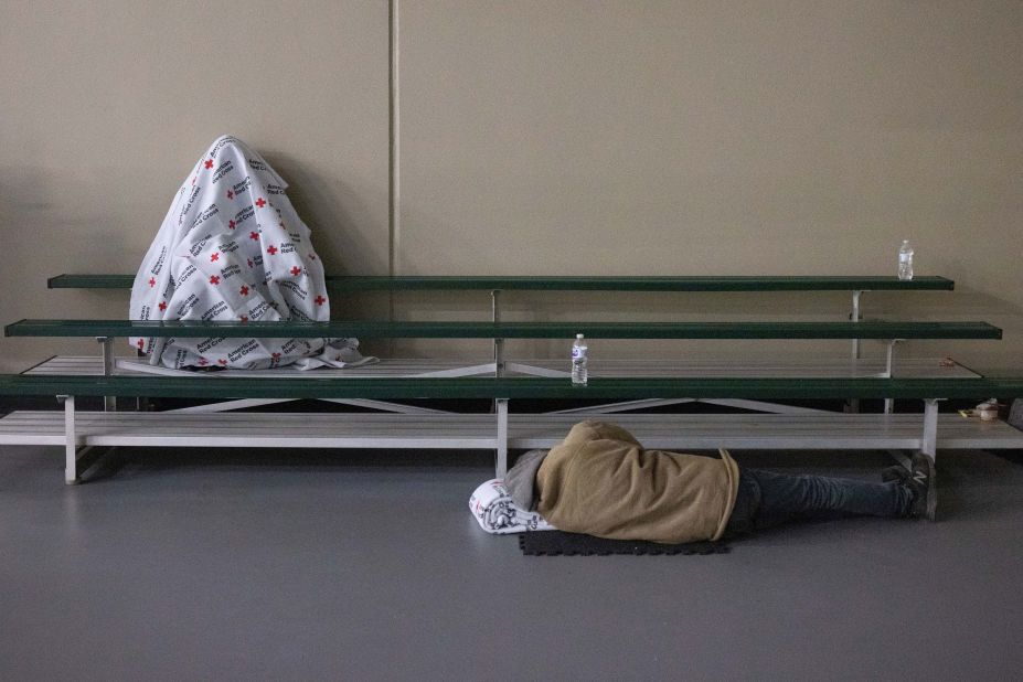 People take refuge at a shelter in Galveston, Texas, on Thursday.