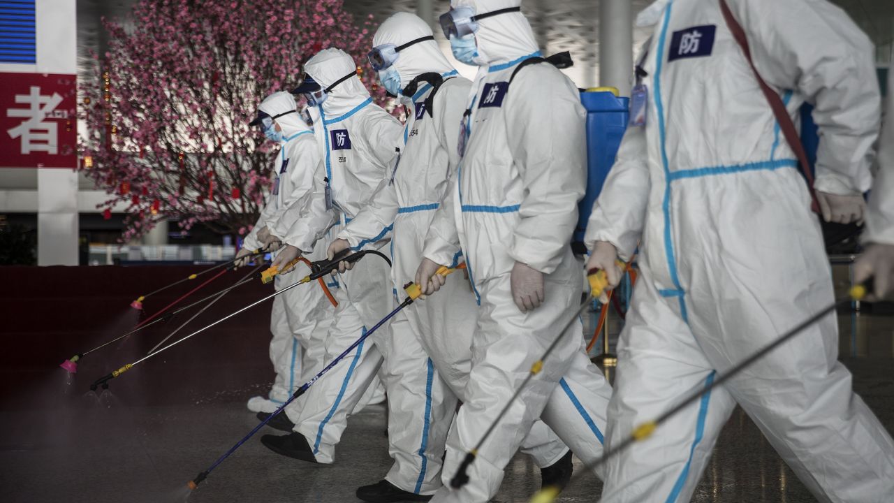 Firefighters disinfect  Wuhan's international airport on April 3, 2020.