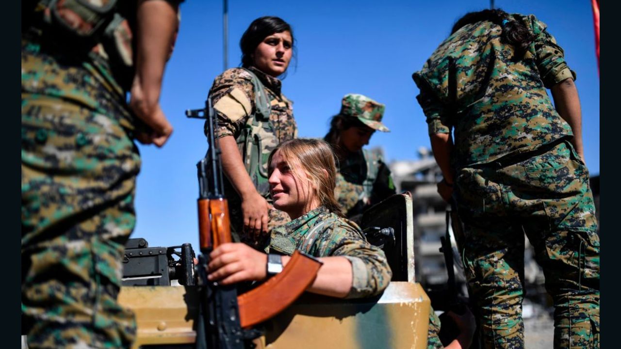 Women of YPJ gather to mark the end of the fight against ISIS in Raqqa.