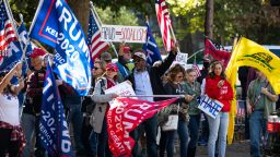 Supporters of US President Donald Trump rally to protest results from the 2020 Presidential election in Raleigh, North Carolina, on November 14, 2020. - Trump supporters are rallying across the country to protest what the the President is calling rampant election fraud perpetrated by the Democratic Party to steal the election. 