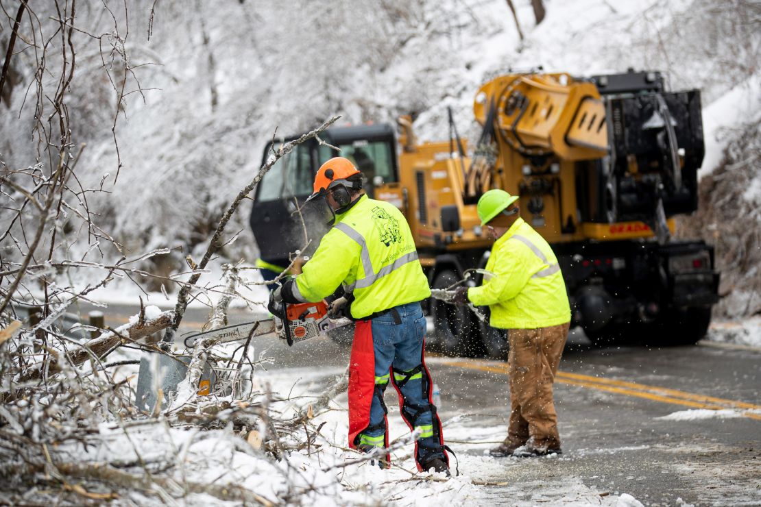 Workers clear the snow in Huntington, West Virginia. 