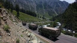 Indian army convoy moves along the Srinagar-Leh National highway towards Ladakh on June 17, 2020.At least 20 Indian soldiers were killed in a violent clash with Chinese forces in a disputed border area.