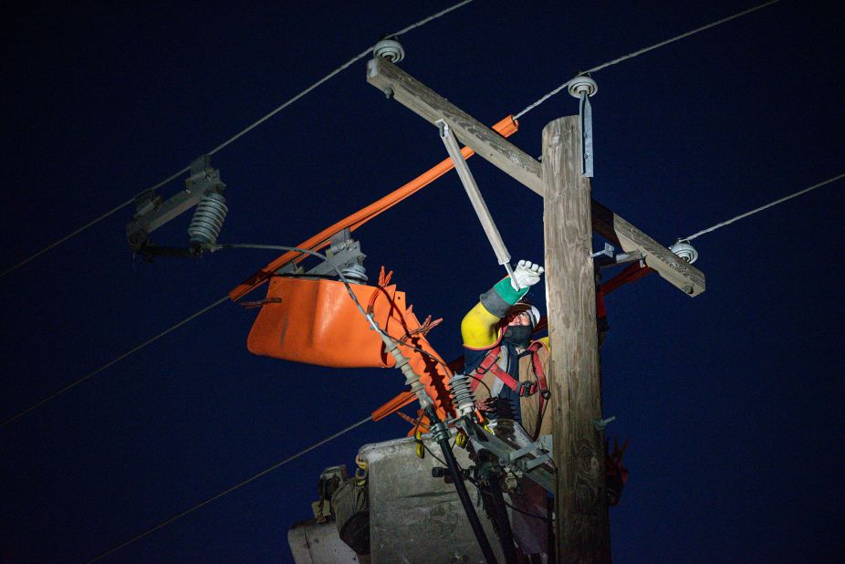 Brendan Waldon repairs a utility pole in Odessa, Texas, on Thursday, February 18.