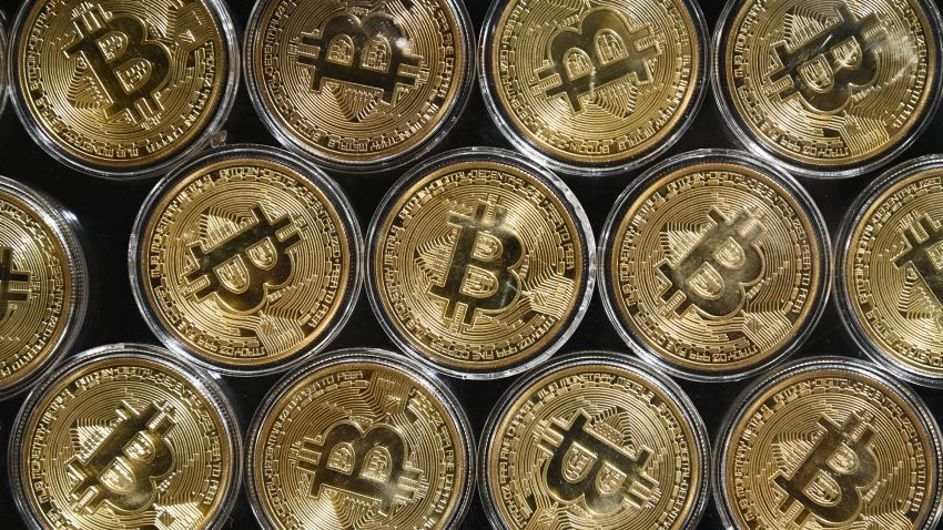 This photograph taken on September 24, 2020 shows a physical imitation of a Bitcoin at a crypto currency "Bitcoin Change" shop, near Grand Bazaar, in Istanbul. (Photo by Ozan Kose/AFP/Getty Images)