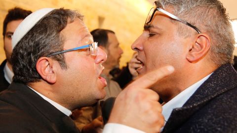 Jewish Power party's Itamar Ben Gvir argues with the Israeli Arab candidate Ata Abu Medeghem of Raam-Balad  after a hearing at the Israeli Supreme Court in Jerusalem, on March 14, 2019
