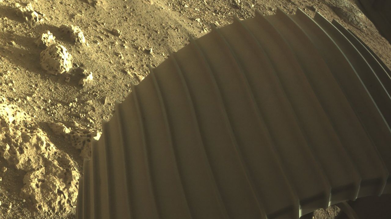 Rocks spotted by the rover have holes in them -- which has the scientists curious to see what would cause them. 