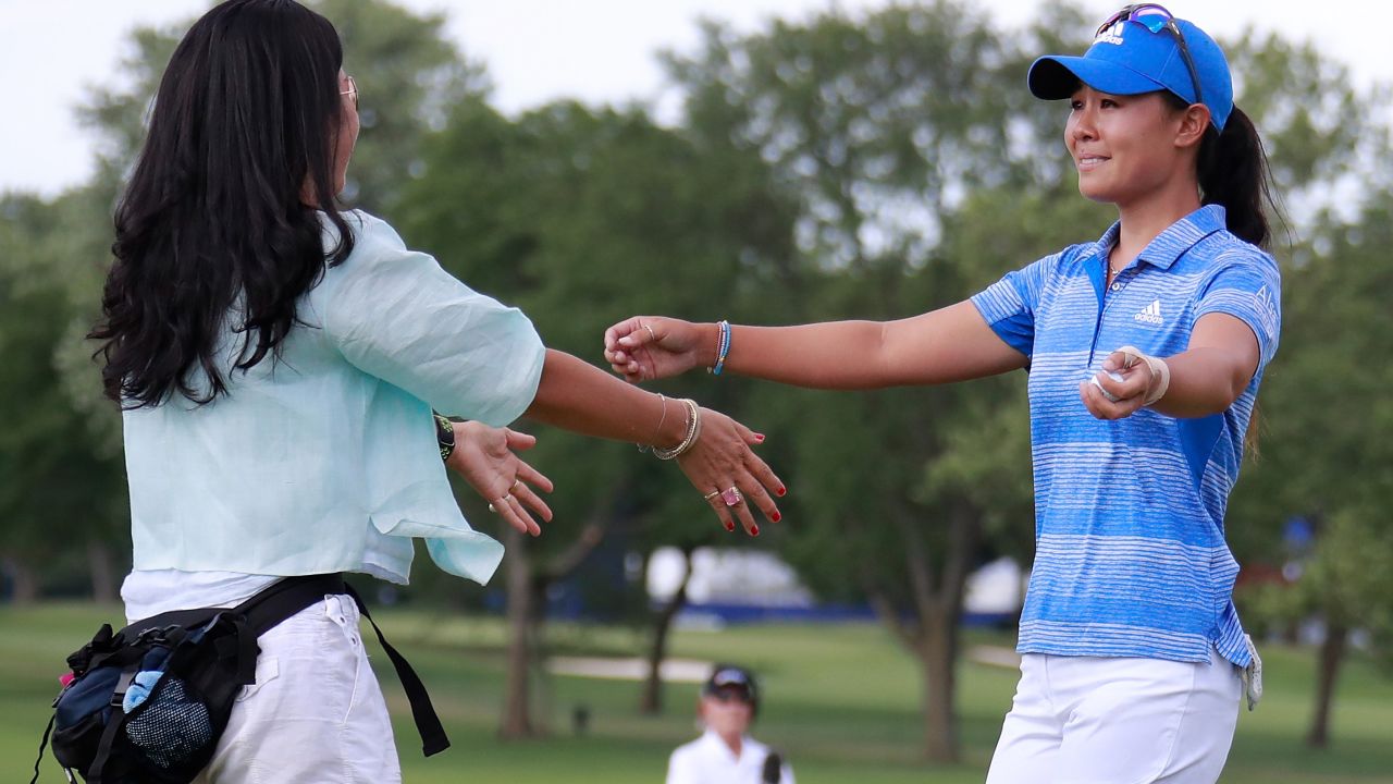 Kang hugs her mom Grace Lee after winning the the 2017 KPMG PGA Championship.