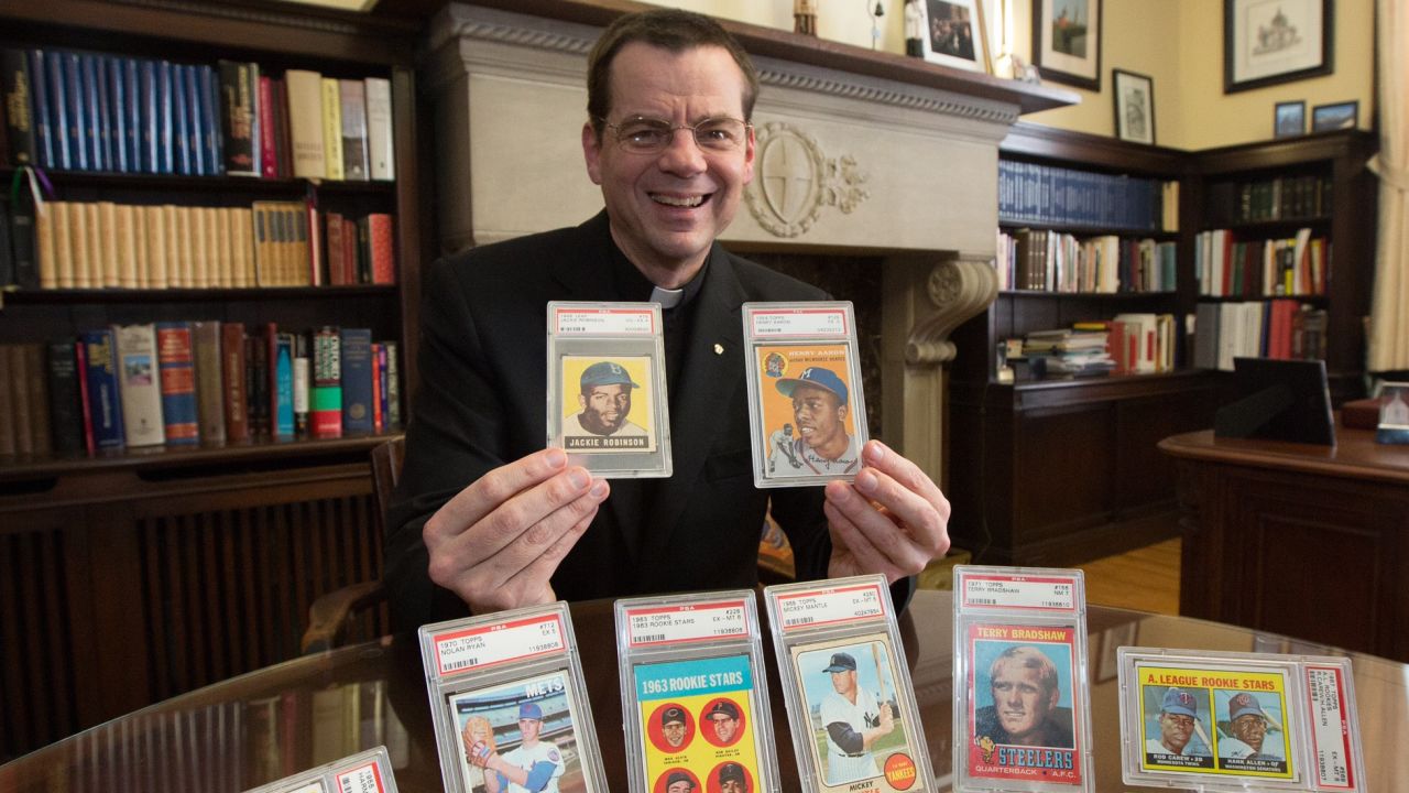 Father John Ubel is auctioning off his 50 most valuable baseball cards